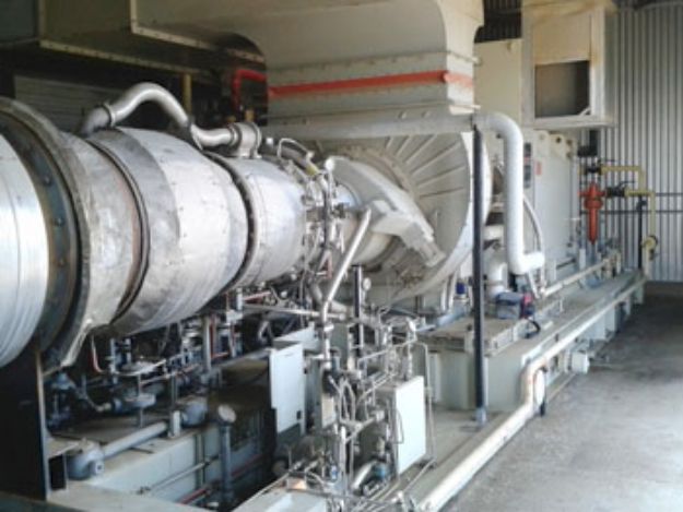 Picture of 3.0 MW Solar Centaur T4701 Open skid inside a building.  747 hour Turbine Engine Hours